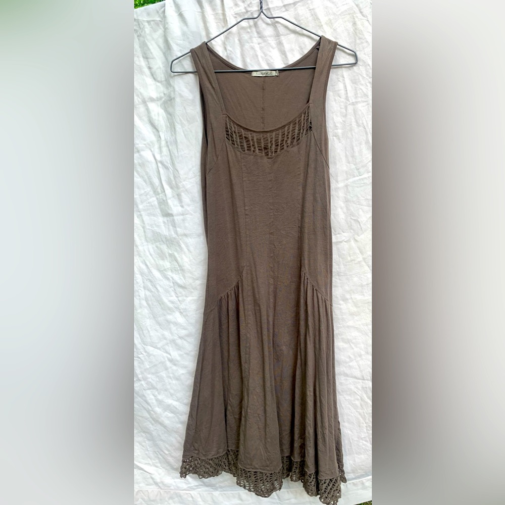 Soft dress by MAKOKA with lace detailing at yolk & hem. Fits Size 4-6